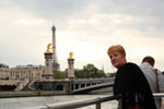 My mom on a seine cruise with the Eiffel Tower
